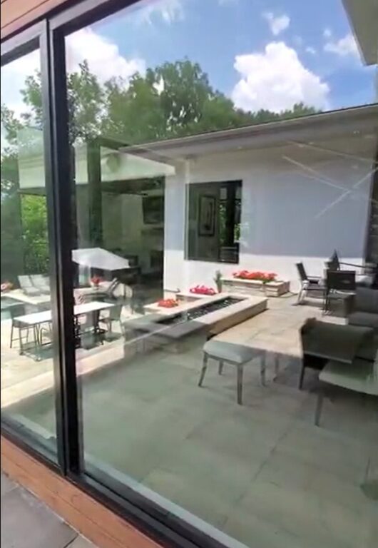 residential window in Dublin showing reflection of deck